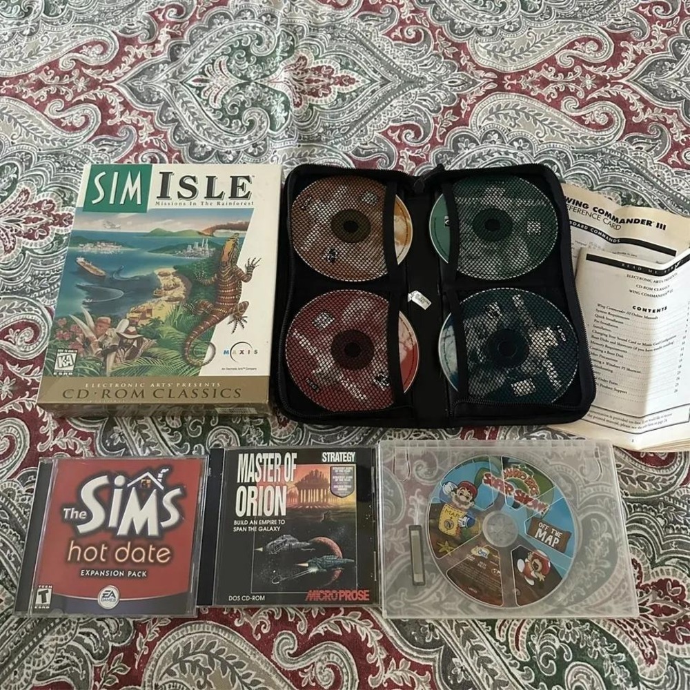Vintage PC Game Lot Sim Isle The Sims Master of Orion Wing Commander III Lot